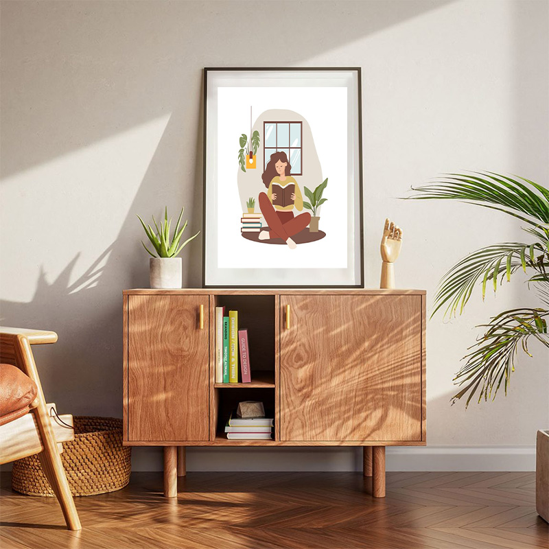Women Reading Book While Sitting Poster